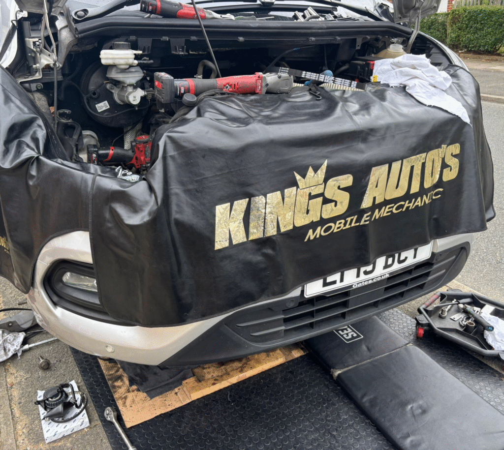 Kings Autos and Sons mobile mechanic van parked in Grays, Essex RM16, equipped with tools for on-site car repairs.